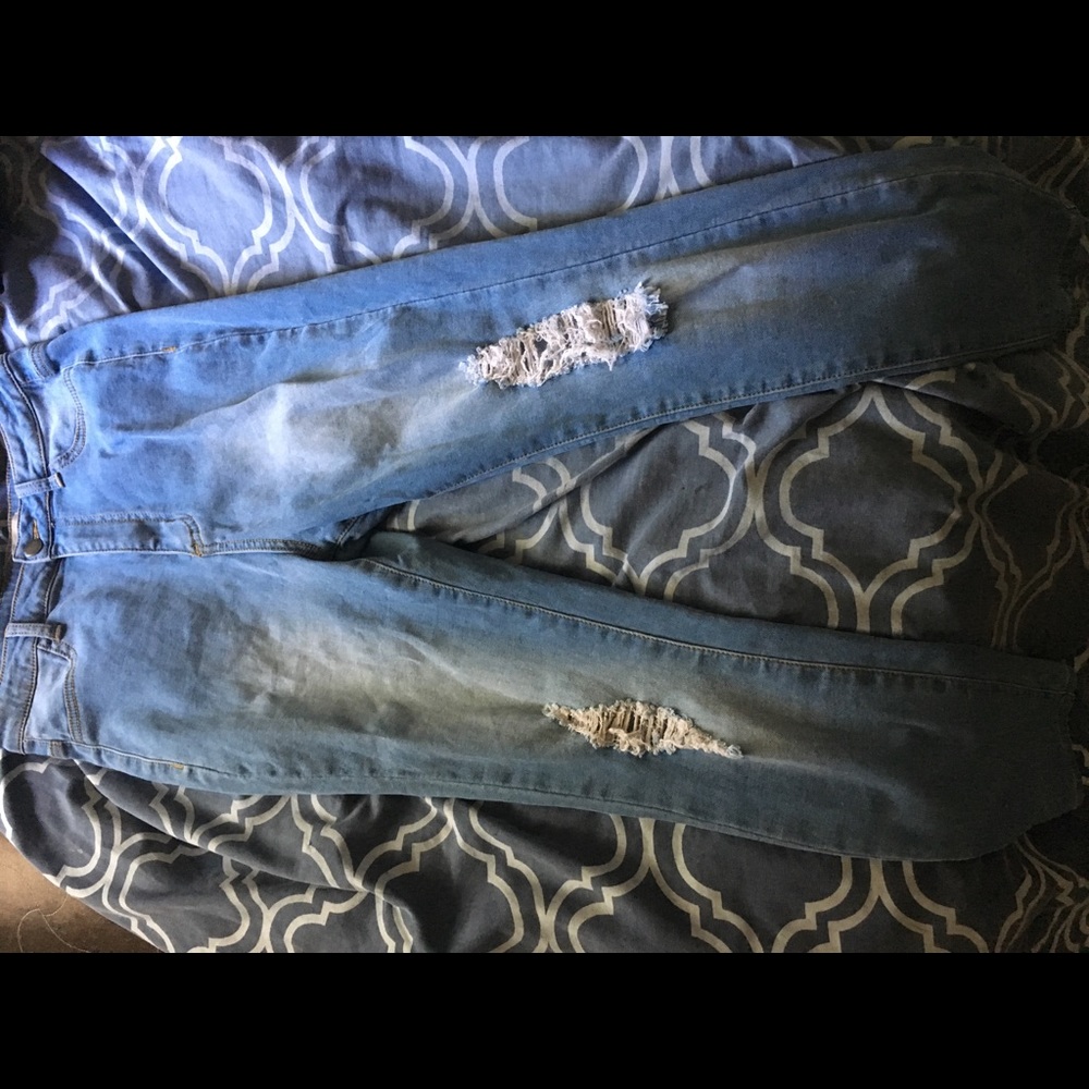 High rise jeans distressed in the knees